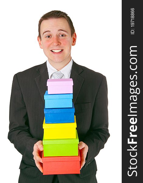 Young businessman with gift boxes