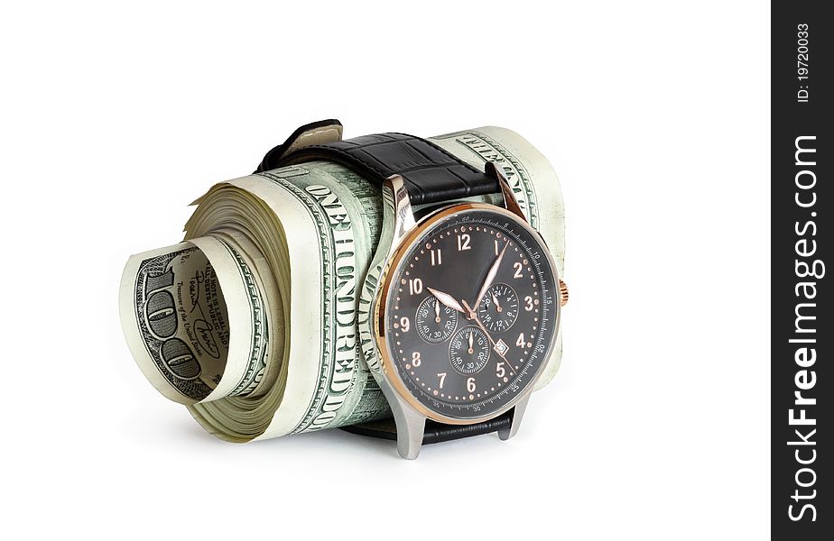 Rolled bundle of one hundred dollars notes inside locked belt of modern wristwatch. Rolled bundle of one hundred dollars notes inside locked belt of modern wristwatch