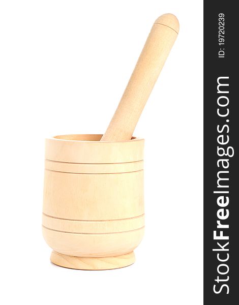 Wooden pounder and pestle on white