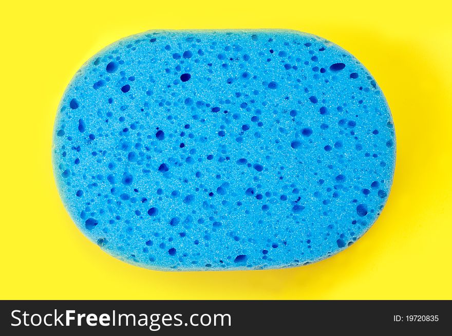 Sponge isolated on a yellow background. Sponge isolated on a yellow background.