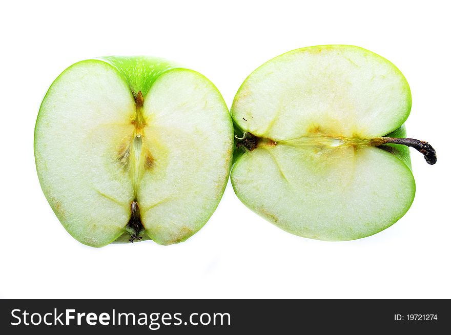 Two pieces green apple isolated on white background.