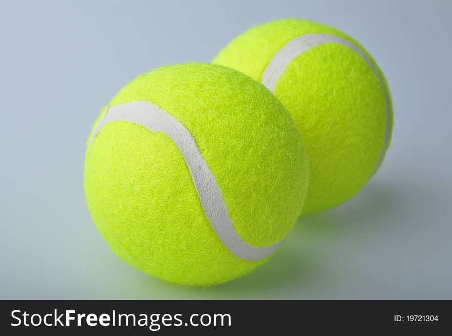 Two tennis balls isolated on the white background.