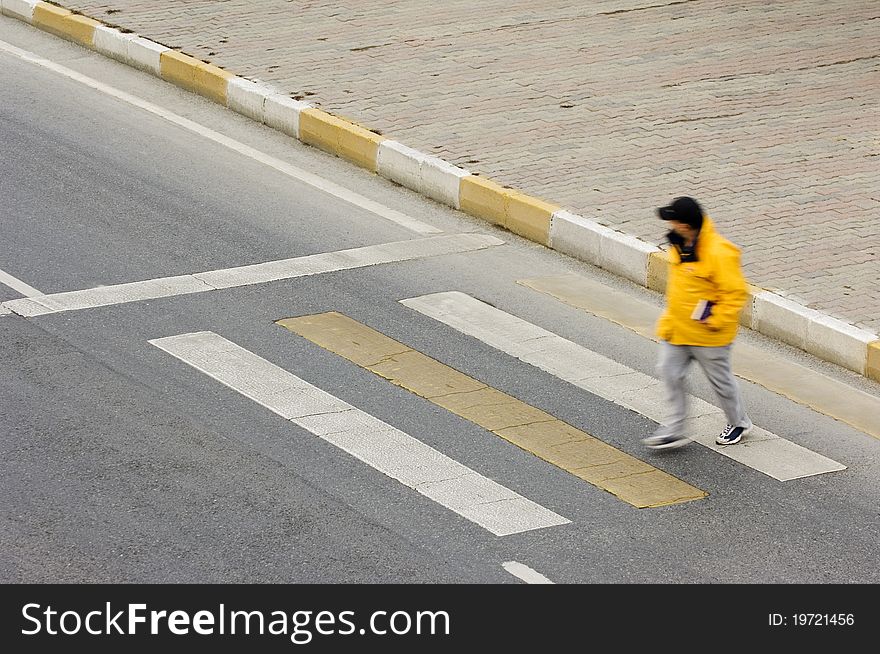 People walking in zebra crossing area. Motion blurred. People walking in zebra crossing area. Motion blurred