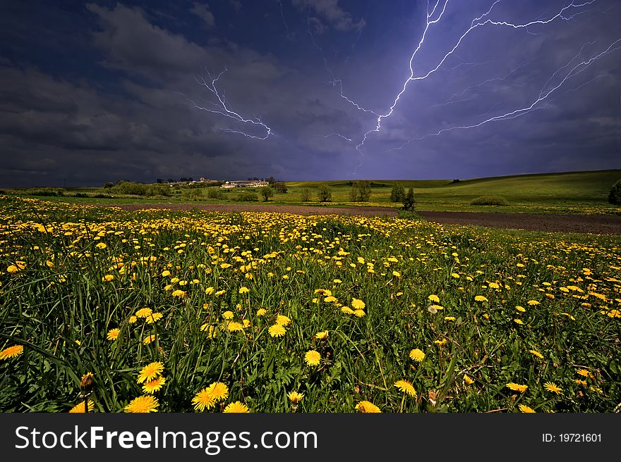 Landscape with a storm sky and lightnings