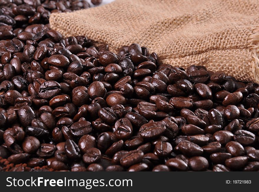 A lot of coffee beans and side of sackcloth.