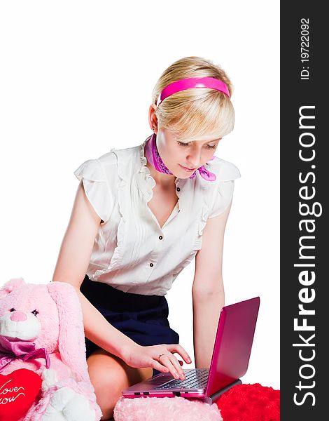 Blond Girl Working With Pink Laptop