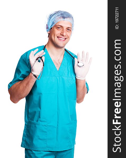 Portrait of a surgeon holding a  stethoscope, isolated against white background