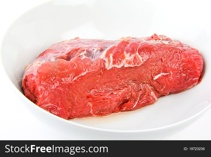 Fresh deer meat. close up, on white background