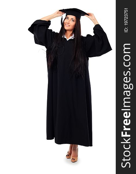 Educational theme: graduating student girl in an academic gown. Isolated over white background.