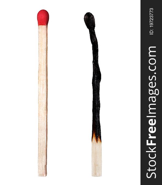 Close-up of a burnt match and a whole red match isolated on a white background. Close-up of a burnt match and a whole red match isolated on a white background