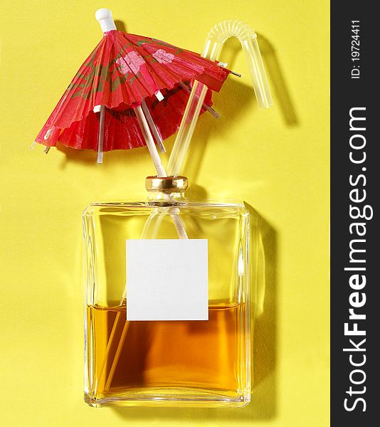 Summer drink made from perfume bottle. Concept photo.