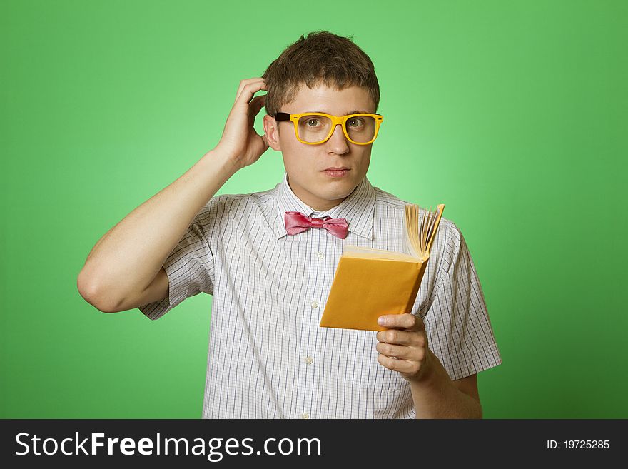 Young man bookworm reading