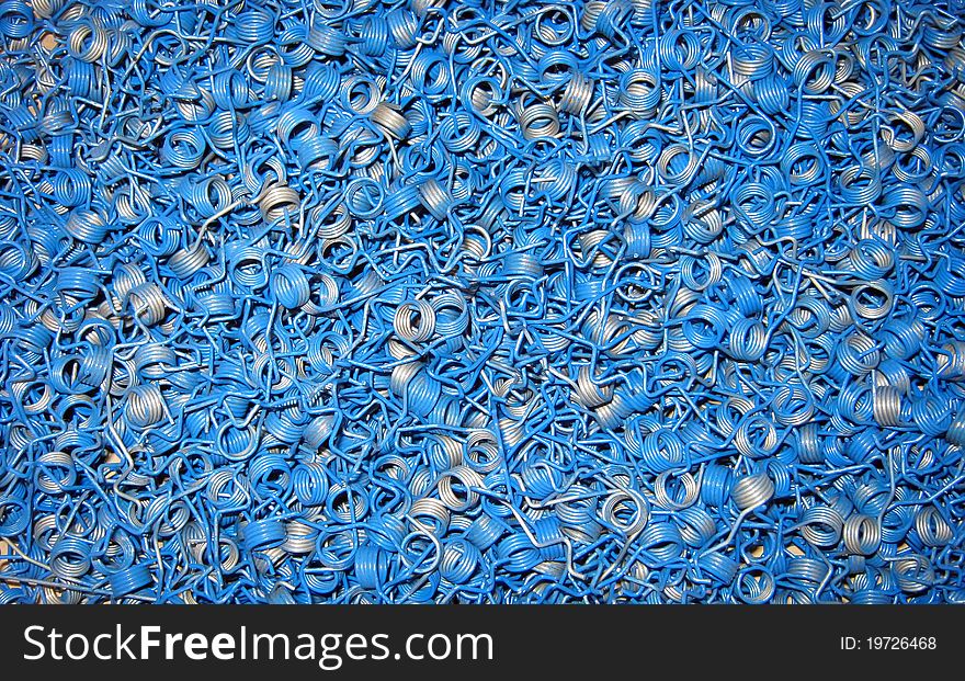 Set of blue springs in bulk ready for assembly. Set of blue springs in bulk ready for assembly