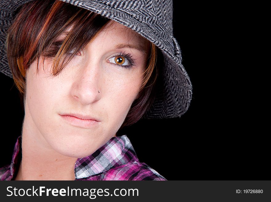 Pretty Girl in a Pink and Black Shirt and a Hat