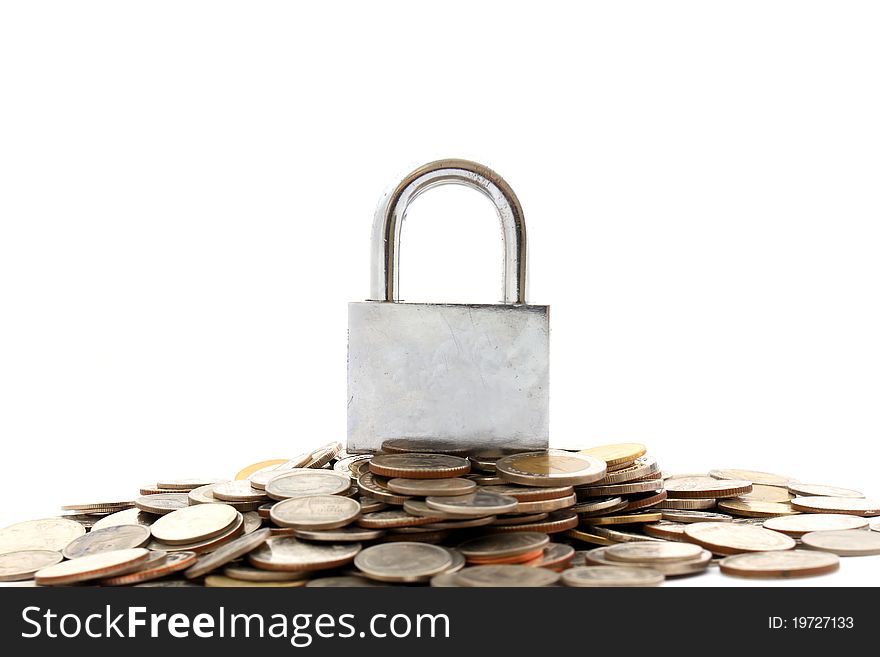 Money locked on lock of the coin and keys. Money locked on lock of the coin and keys