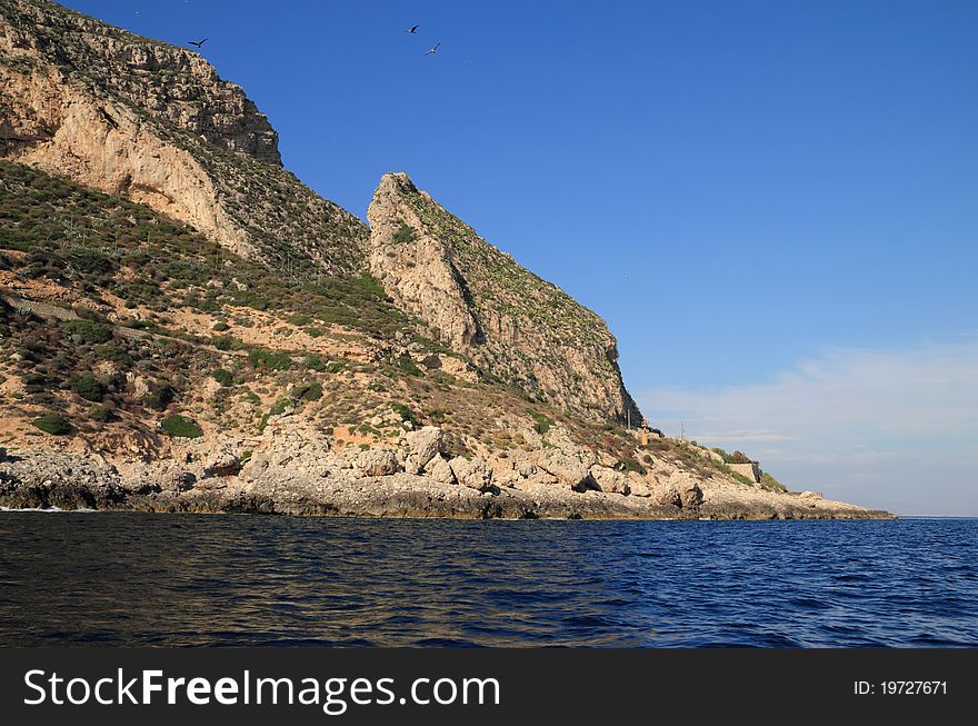 The limestone cliffs of Levanzo in Egadi Islands - Sicily. The limestone cliffs of Levanzo in Egadi Islands - Sicily