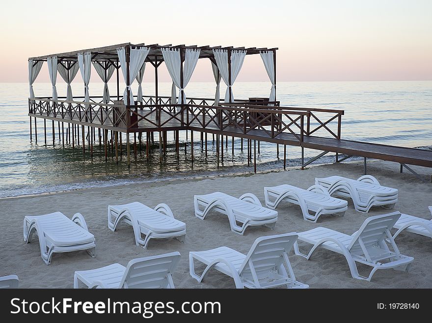 Cafe on the Black Sea at sunset