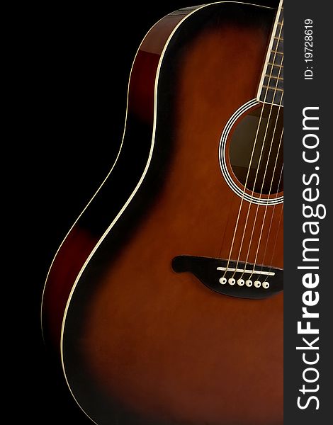 Classical guitar on black background