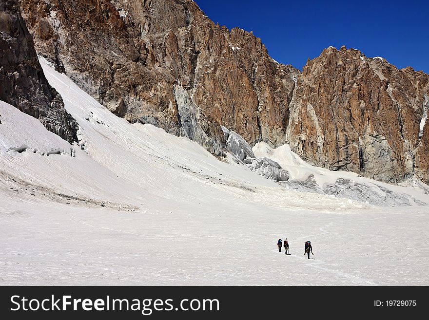 Climbers In The Snowy Mountains