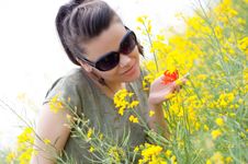 Brunette Girl With A Corn Poppy In Her Hand Stock Photo Brunette Girl With A Corn Poppy In Her Hand Stock Photo