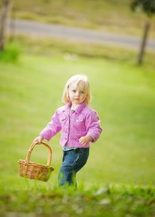 A Cute Little Girl Holding A Basket Royalty Free Stock Photos A Cute Little Girl Holding A Basket Royalty Free Stock Photos
