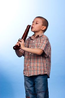 Cute Boy Playing With The Gun Stock Photography