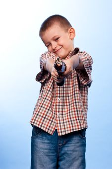 Cute Boy Playing With The Gun Stock Image