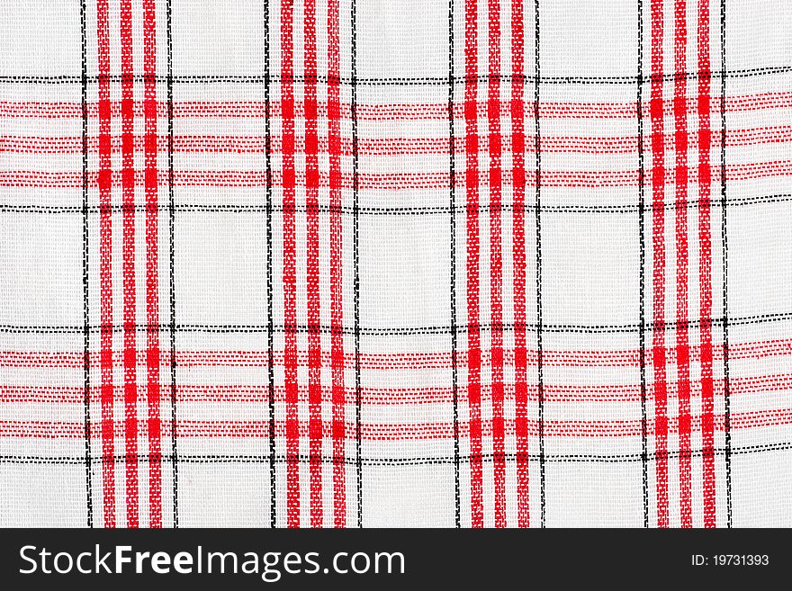 Checkered red and white tablecloth macro background. Checkered red and white tablecloth macro background