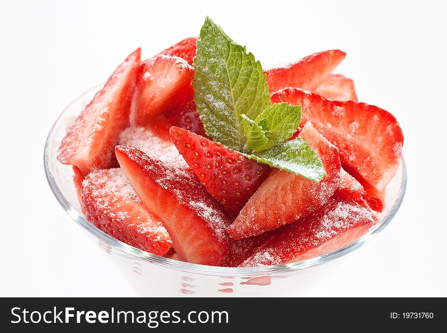 Cocktail from a strawberry close up on a white background. Cocktail from a strawberry close up on a white background