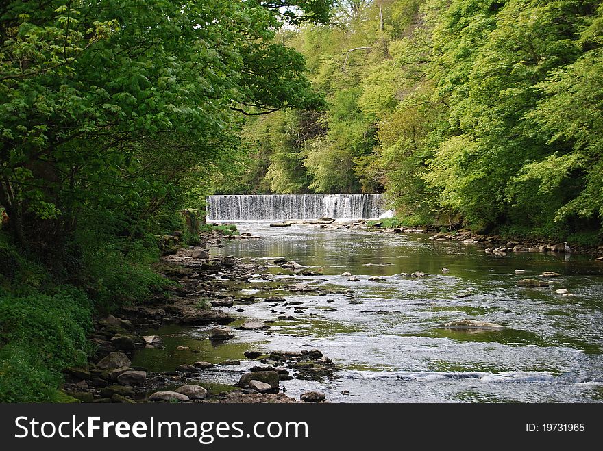 A waterfall on the river Almond near Edinburgh at Crammond. A waterfall on the river Almond near Edinburgh at Crammond