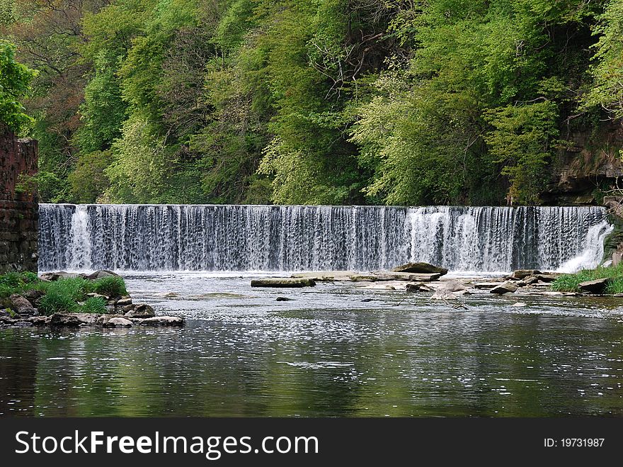 A view of the waterfall on the river Almond at Crammond near Edinburgh. A view of the waterfall on the river Almond at Crammond near Edinburgh