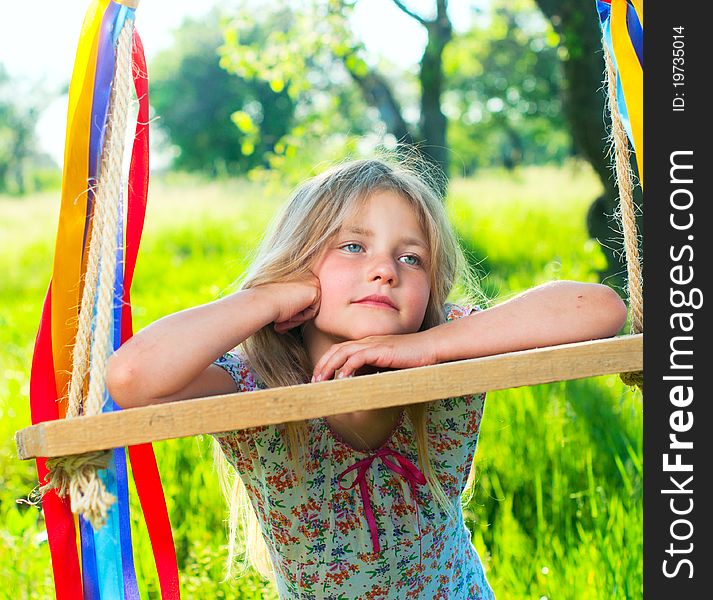 Young Girl On Swing