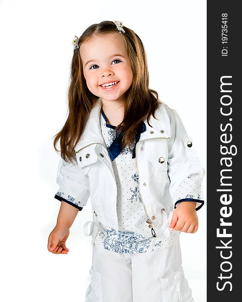 Cute little girl in studio on white background