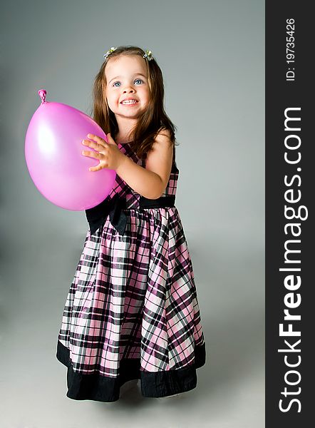 Cute little girl in studio on white background