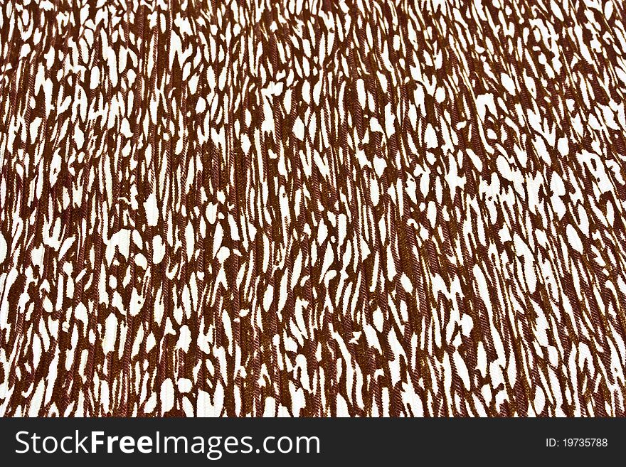 A background of a closeup of printed nylon fabric. A background of a closeup of printed nylon fabric