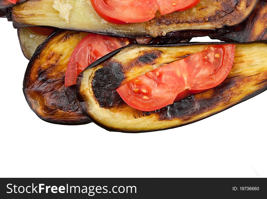 Fried eggplants with fresh tomato isolated on white