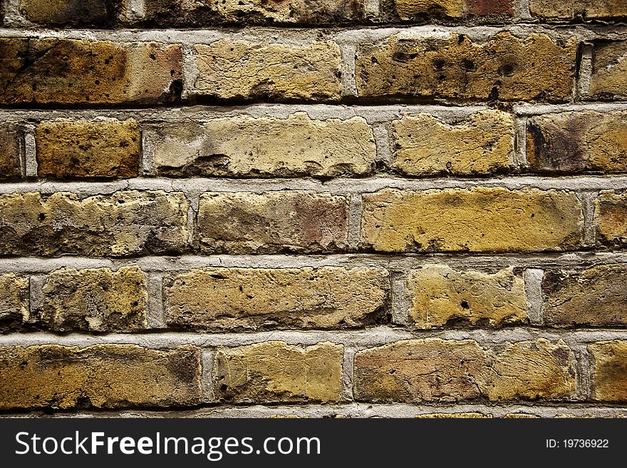 Image of aged external bricks on the outside of a residential dwelling. Image of aged external bricks on the outside of a residential dwelling