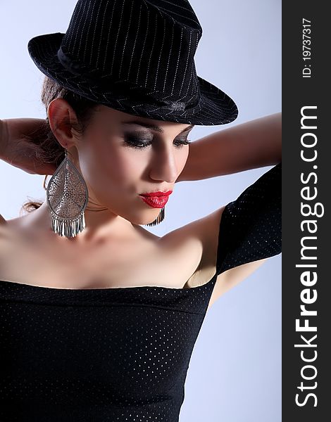 High fashion headshot beautiful model wearing hat