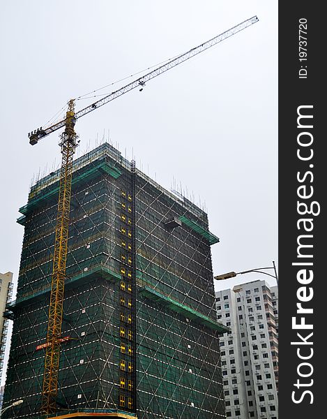 The photo of Building under construction .