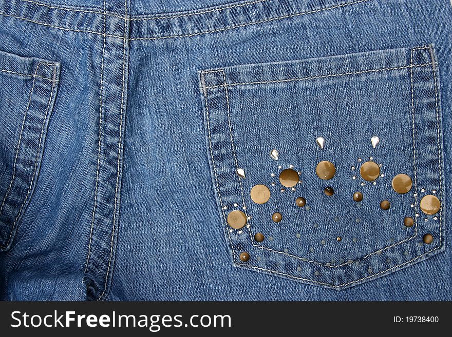 Fancy pocket with rhinestones on women's jeans. Fancy pocket with rhinestones on women's jeans.