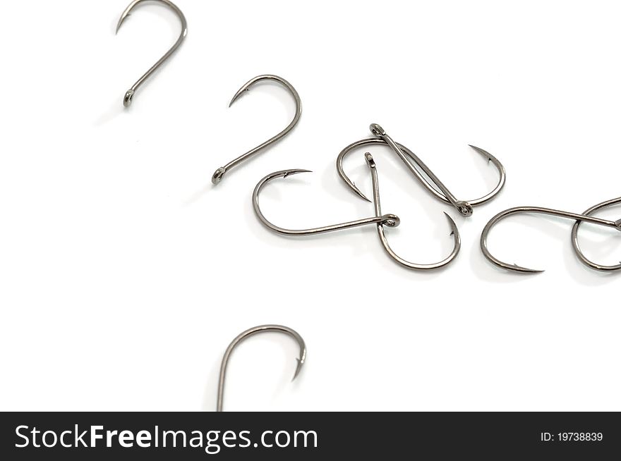 Fish hooks on a white background