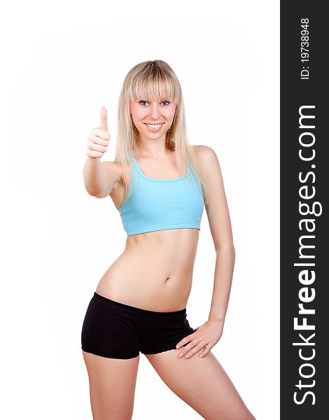 Young attractive, beautiful fitness woman smile holding thump up sign, isolated over white background. Sport, health, success concept. Empty copy space. Good work!. Young attractive, beautiful fitness woman smile holding thump up sign, isolated over white background. Sport, health, success concept. Empty copy space. Good work!