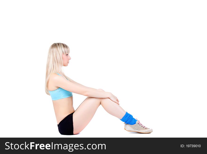 Fitness woman sitting