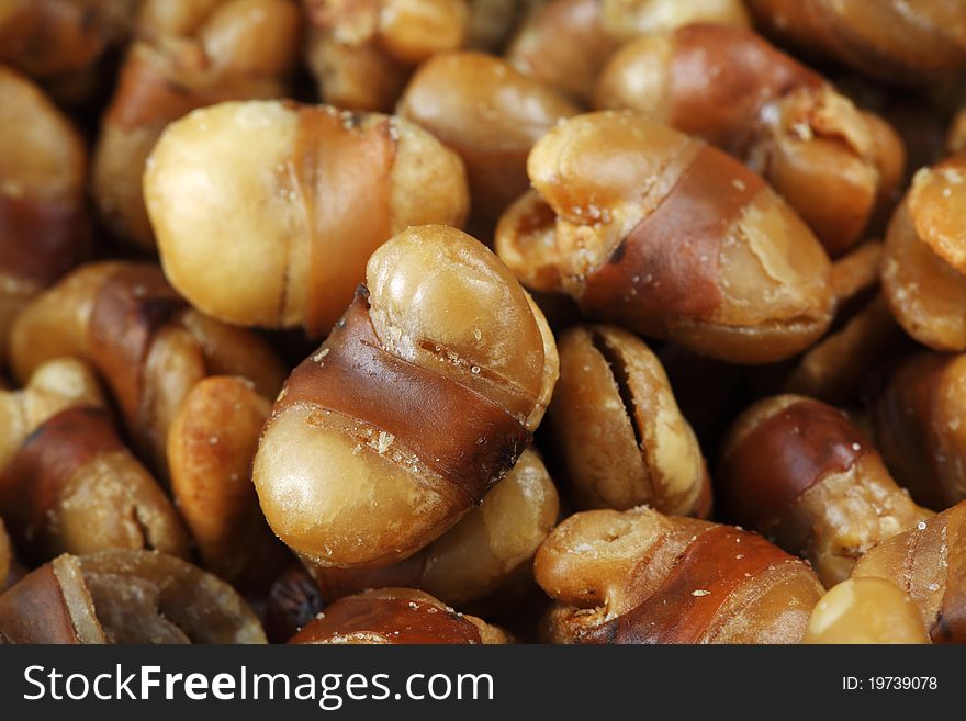 Close up of seasoned horse beans isolated on white background.