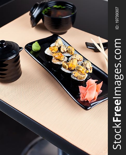 Japanese table place setting with roll