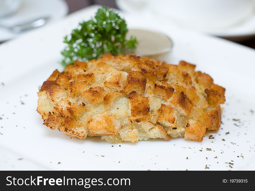 Gourmet meat in bread crumbs - food