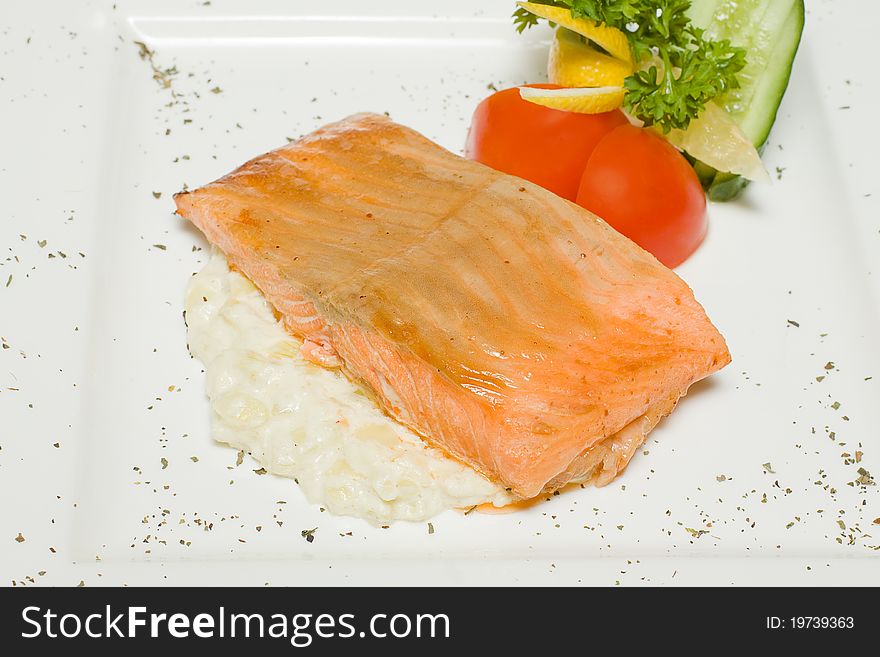 Red fish - trout steak with vegetables. Red fish - trout steak with vegetables