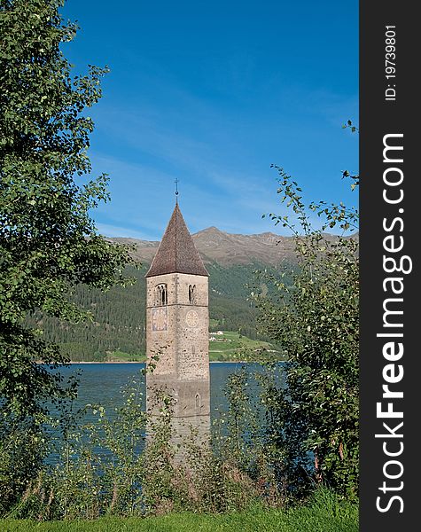 Reschenpass Clock tower in the lake