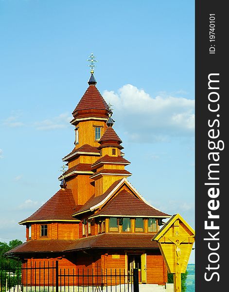 Facade Of A Building Of Wooden Catholic Church