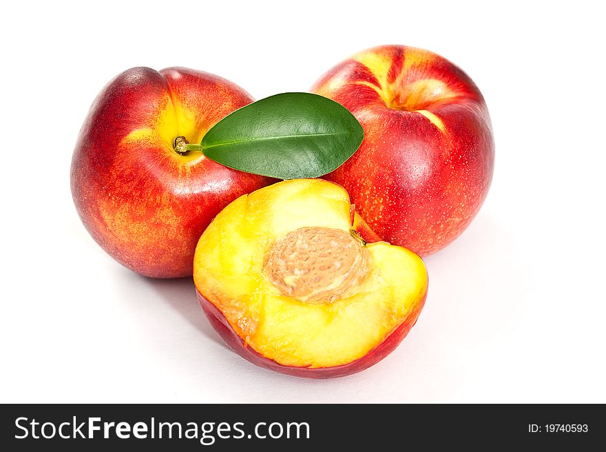 Nectarines on a white background